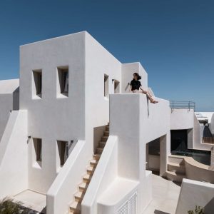Areos luxury suites hotel under blue Santorini's sky